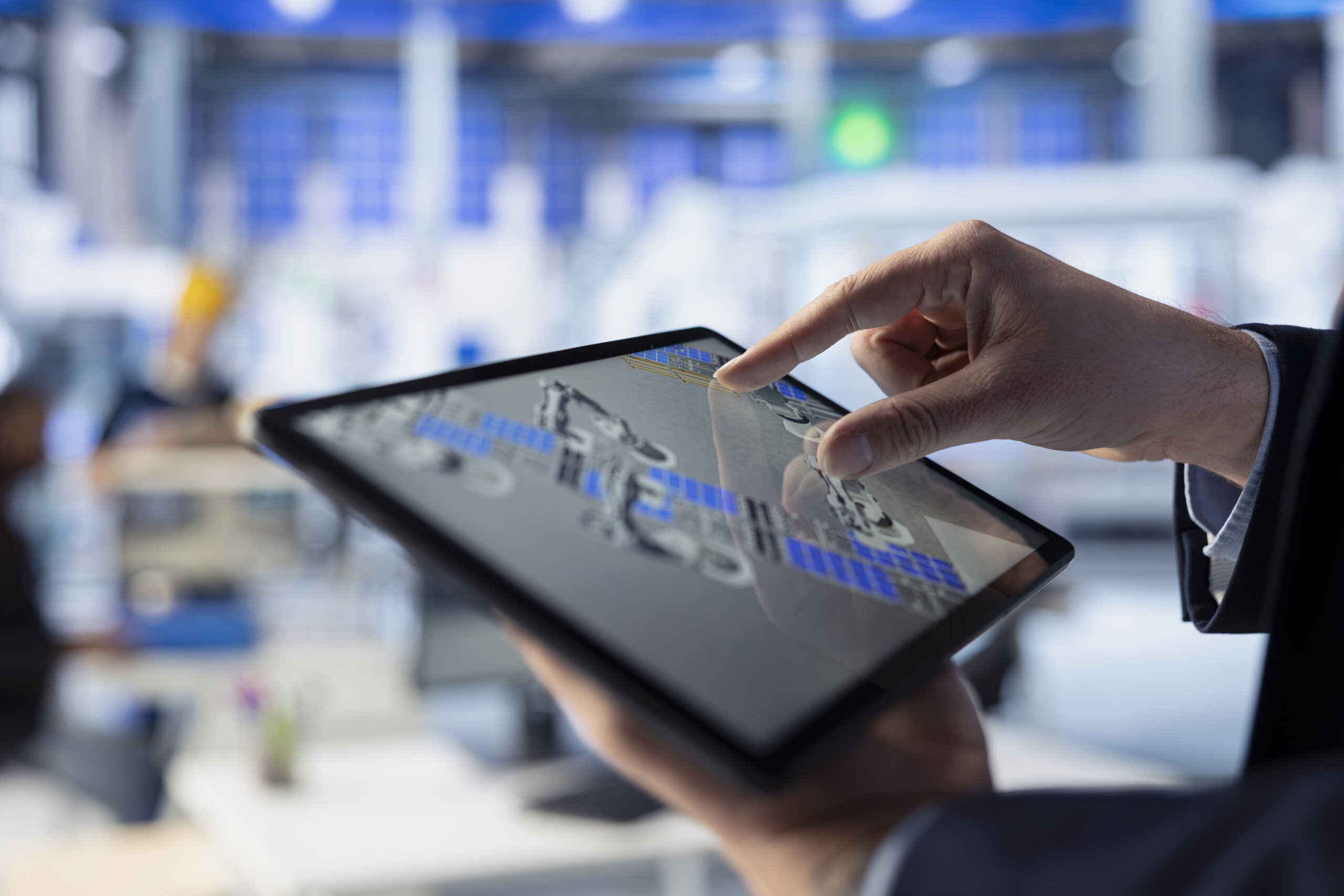 Close up of photovoltaics factory expert conducting experiments using tablet